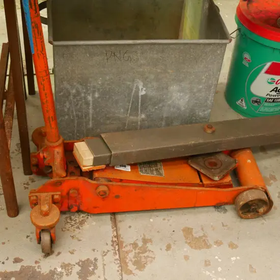 large hydraulic curb jack with spreader bar