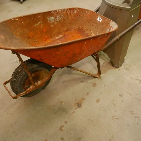 rusty contractor's wheelbarrow