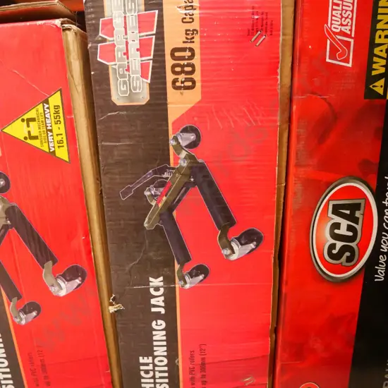 hydraulic vehicle positioning jack