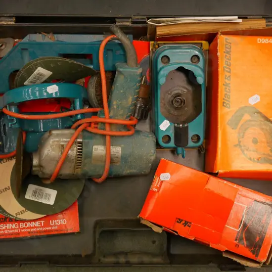 plastic tub of Black and Decker drill and accessories