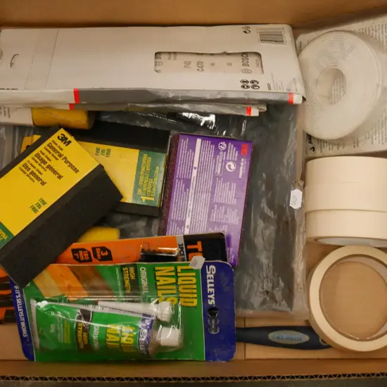 box; painters tape, liquid nails, sanding sponge etc