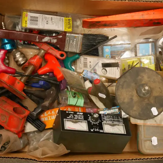 box; allen keys, paint brush, frequency tester etc