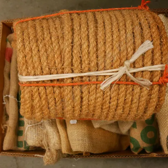various coffee sacks, roll of jute rope