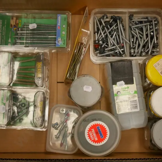 box of various screws and fasteners