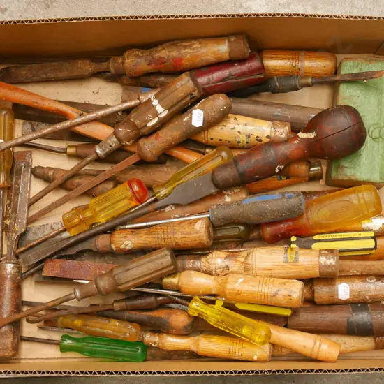 box; numerous chisels
