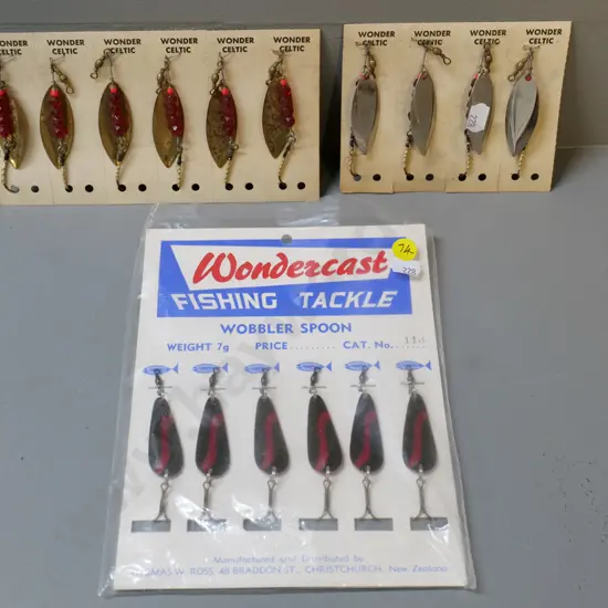 16 assorted unused Wonder brand fishing lures on retail card backing