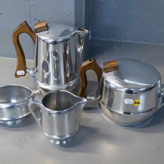 4-piece Picquot polished pewter tea set with wooden handles - how water pot is H-190