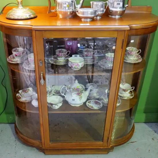deco (kauri?) bow-front china cabinet with glazed sides and single door, chrome & bakelite handle H-1040 W-1030 D-380