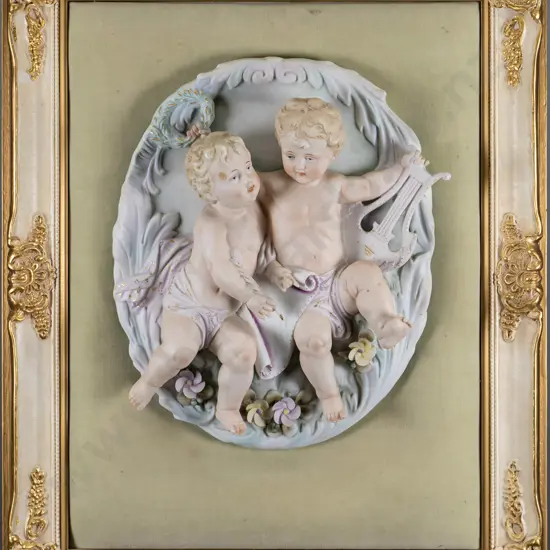 gilt framed 3D ceramic cherubs on velvet background H-430 W-330