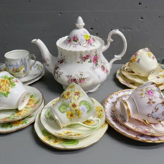 Royal Albert Lavender Rose teapot and 3 Royal Albert trios, a Tuscan trio, and a Salisbury trio