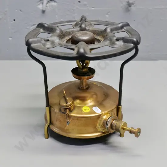 brass camp stove - engraved Paraffin only, Made in England, faint Coleman mark? Has had repairs. H200 D-230