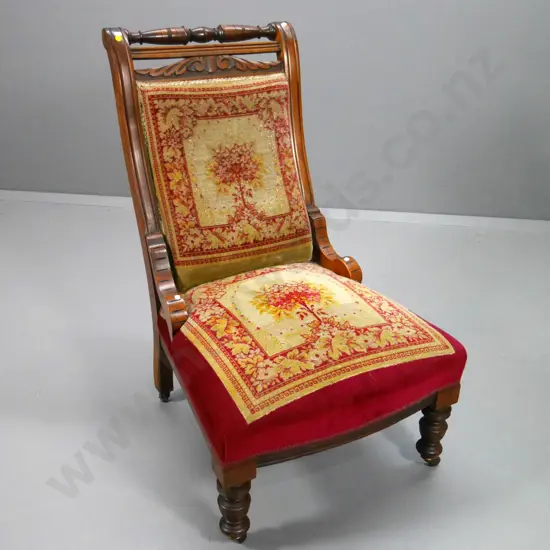 Edwardian armless lounge chair w/carved back rail, porcelain casters, original velvet H970 W640 D790