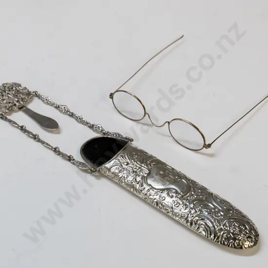 silver plated chatelaine spectacle case with vintage gold-framed spectacles