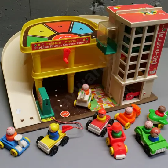 Fisher-Price garage with working lift, assorted vehicles & figures, some from other sets. Some wear and tear. H260