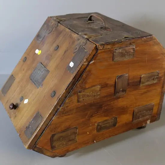 timber coal bin with hinged lid, decorated with pressed metal collector cards - some bent or damaged H360 W290 D440