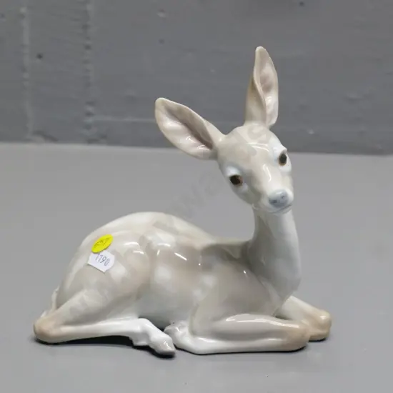 Lladro sitting fawn figure measuring H-180 L-170
