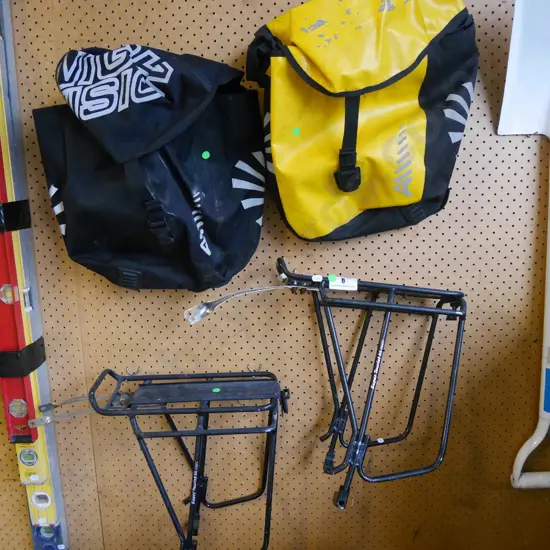 2x bike carriers and pannier bags - green dots