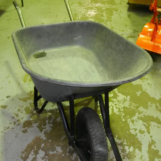 large contractor's black plastic wheel barrow