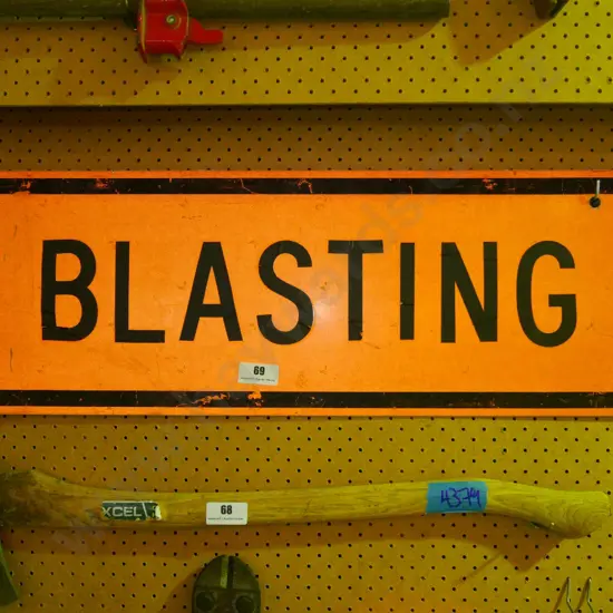 BLASTING sign
