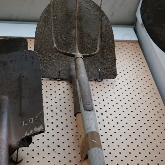 rusty shovel, pitch fork