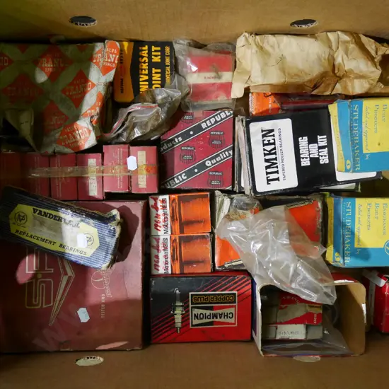 box; automotive allsorts; pistons, bearings, spark plugs etc