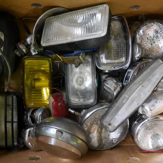 box of vintage automobile lights