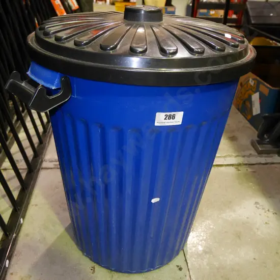 blue plastic rubbish bin