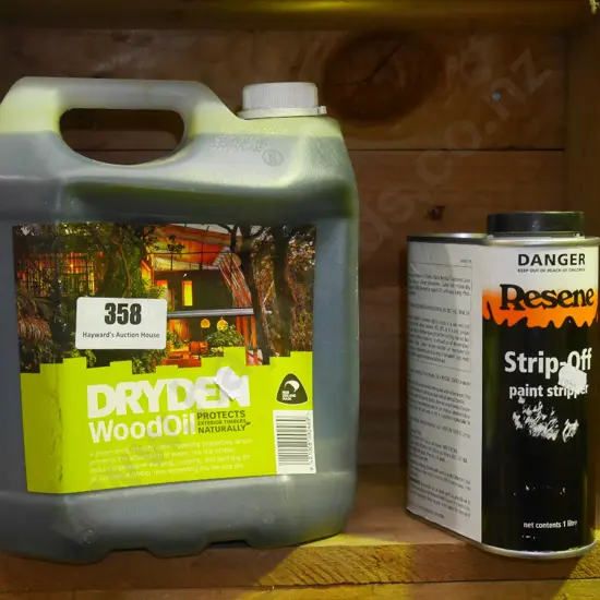 containers of wood oil and paint stripper