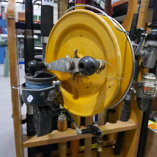 boat rod with large reel, rod & reel & one other rod (green dots)