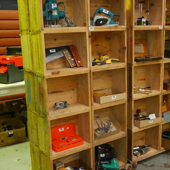 home made double sided shelf unit on wooden casters made from Dairy Board butter boxes H-1710 W-820 D-430