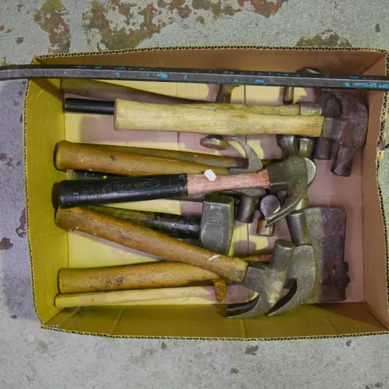 box; various hammers, wrecking bar