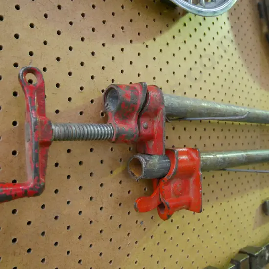 2 pipe clamps - green dots