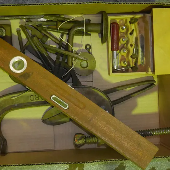 box; builder's level, G clamp, punches etc