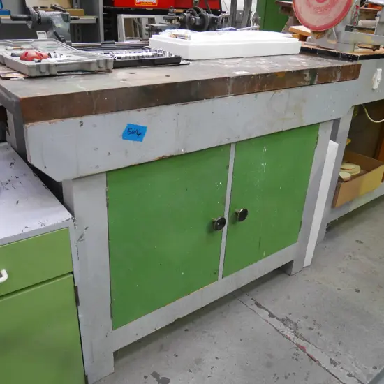 homemade wooden workshop bench with hard wood top and 2 cupboard doors