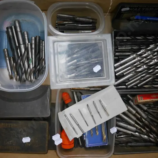 box of various drill bits