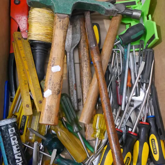 box; screwdrivers, hammer, string line, riveter etc