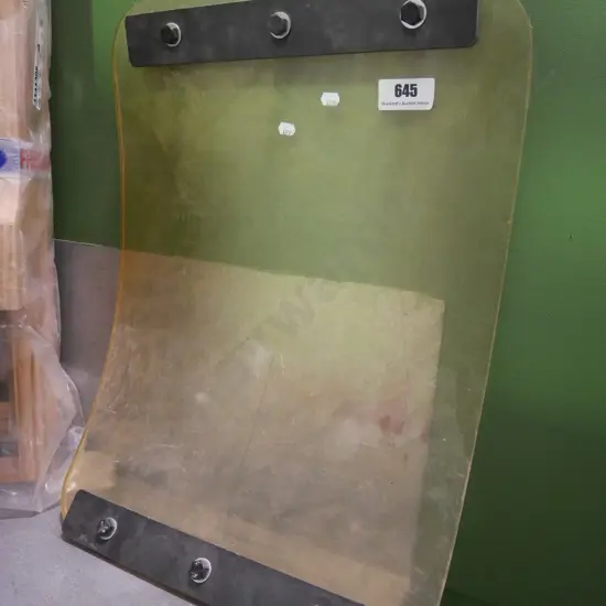 heavy rubber rectangle - possibly used for plate compacting cobblestones