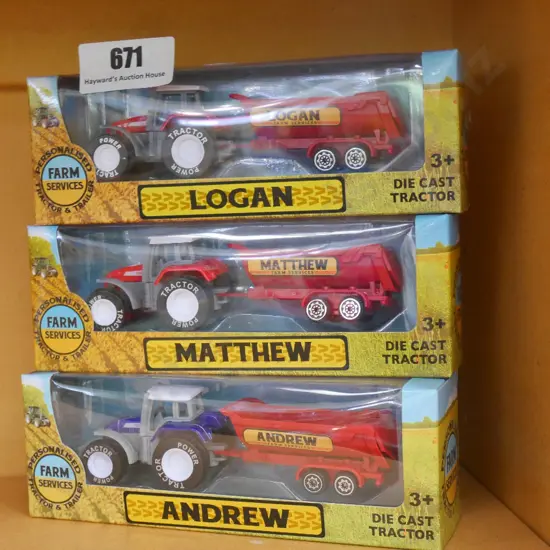 3 boxed tractor and trailer model vehicles