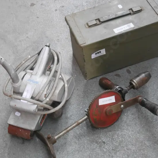 vintage belt sander, egg beater drill, ammunition case