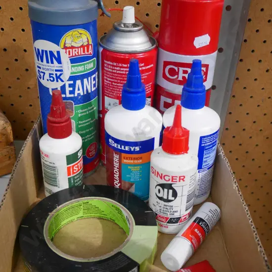 box of various glues, painters tape etc