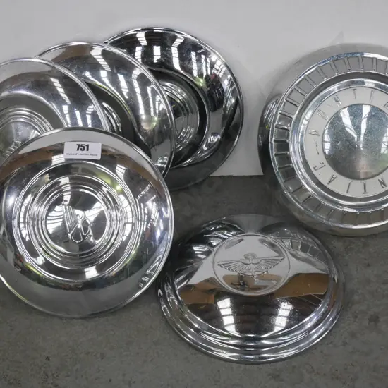 4 Austin hub caps, 3 other hub caps