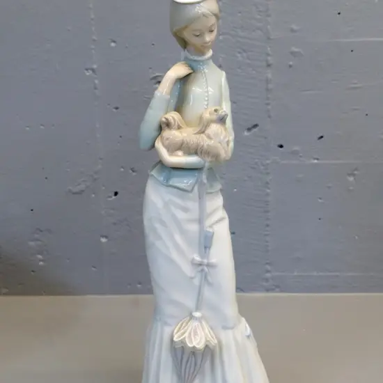 large Lladro figurine - woman with a dog, marks hard to read H-380