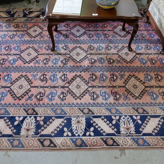 large Persian hand-knotted wool floor rug - reds blues and browns - some fading L2940 W1930