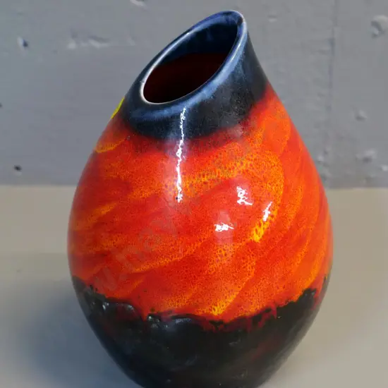 Empire ware vase with orange sponged and charcoal glaze, small firing fault on rim H-200