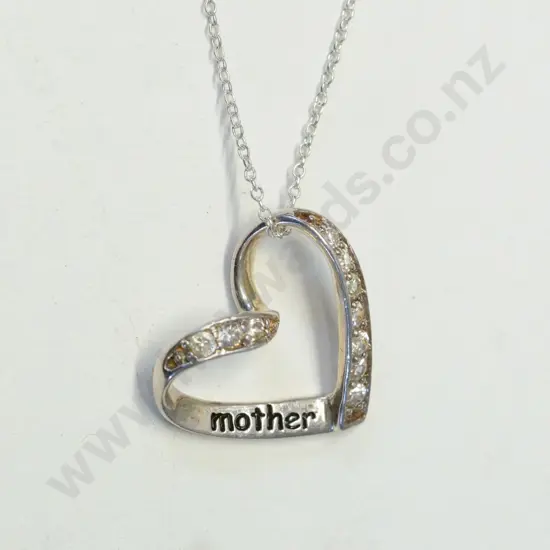 silver heart shaped necklace with czs & has mother engraved on it stamped 925