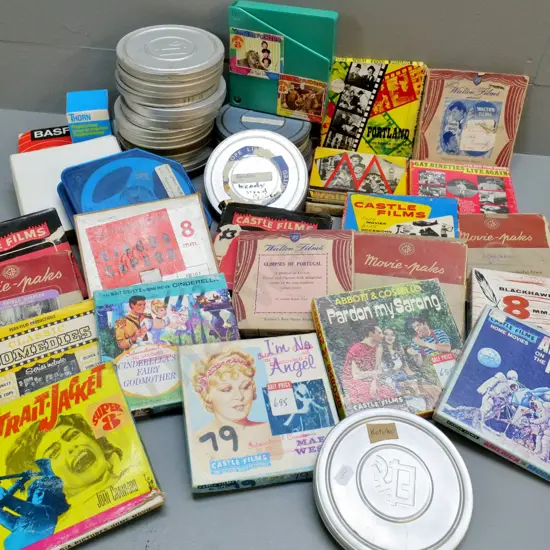 assorted 8mm films on 5" reels - some in unmarked tins: Mae West, Joan Crawford, Abbott & Costello, etc.