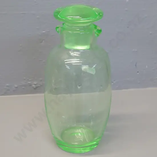 green uranium glass stoppered pouring bottle - has chip to underside of stopper H-210