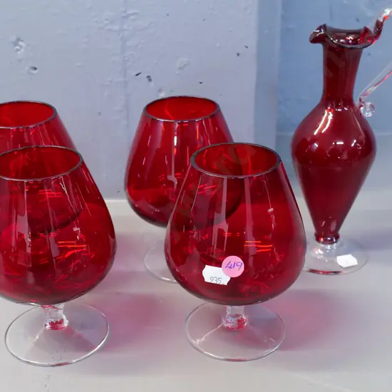 4 ruby glass on clear stem brandy balloons & a ruby glass jug with clear base and handle H210