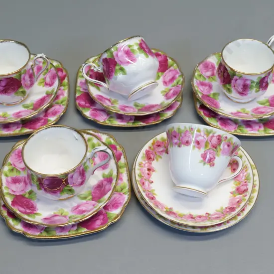 4 Royal Albert Old English Rose trios and a Royal Doulton rose pattern trio