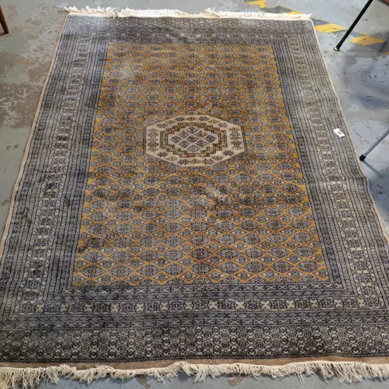hand-knotted Persian rug (fine wool or silk blend?) gold and charcoal tones L1810 W1250